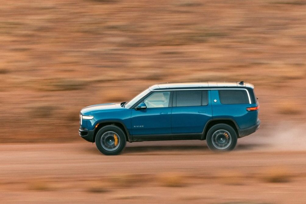 Blue Rivian R1S on the move