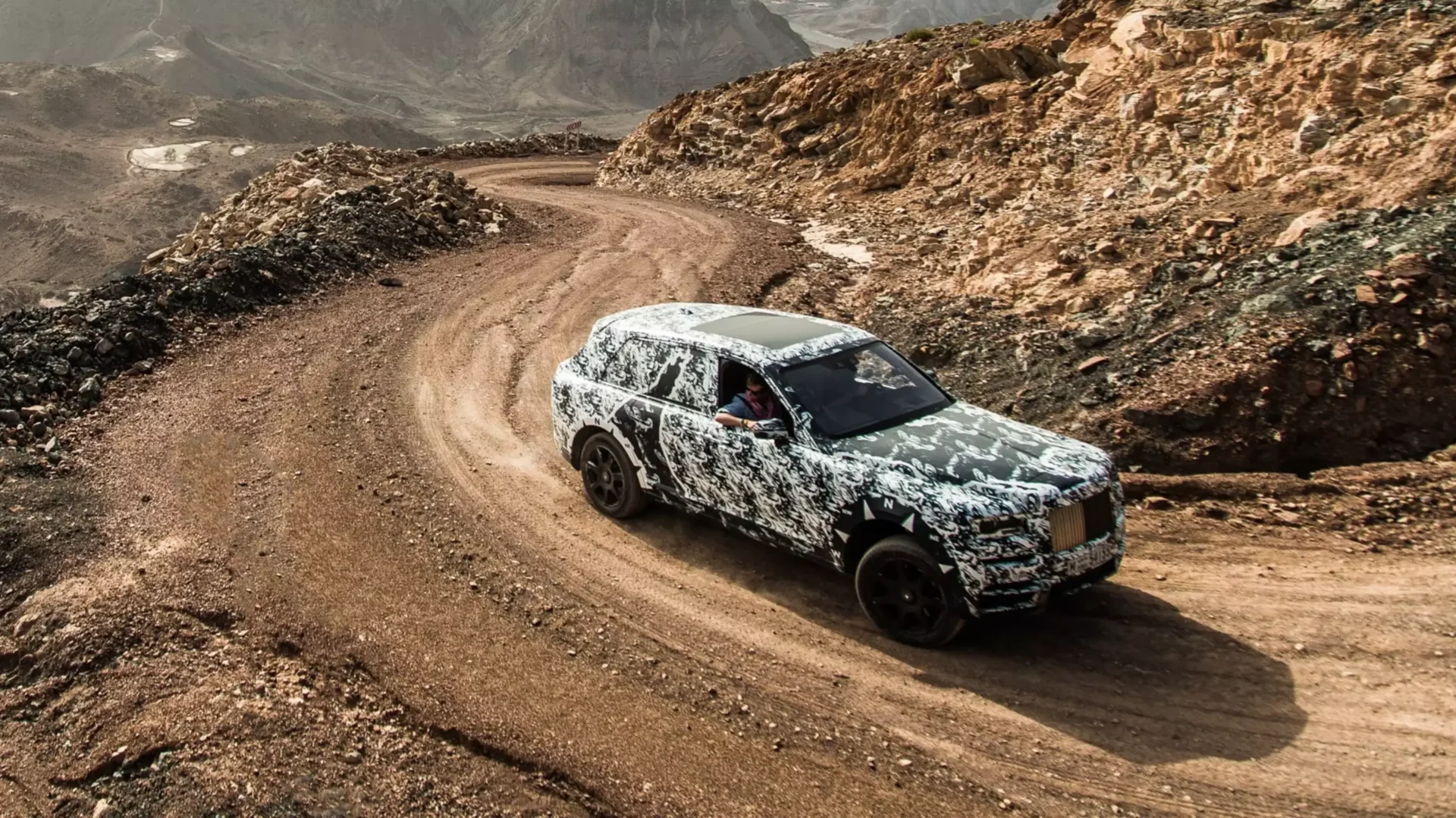 Mountain climbing in a Rolls-Royce SUV