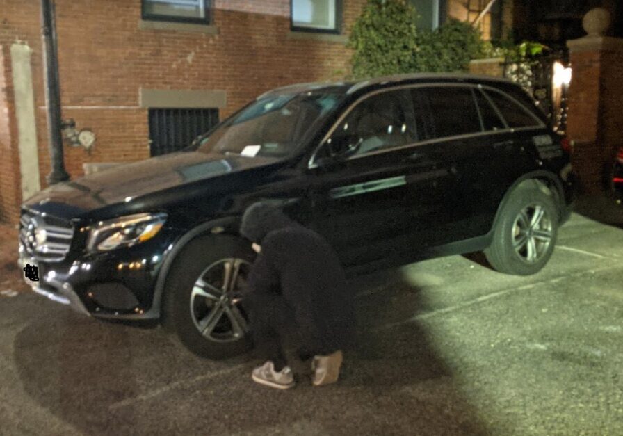 Person deflating an SUV tire