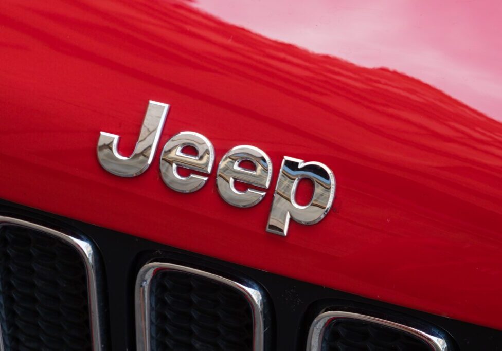 Jeep Logo on a red SUV